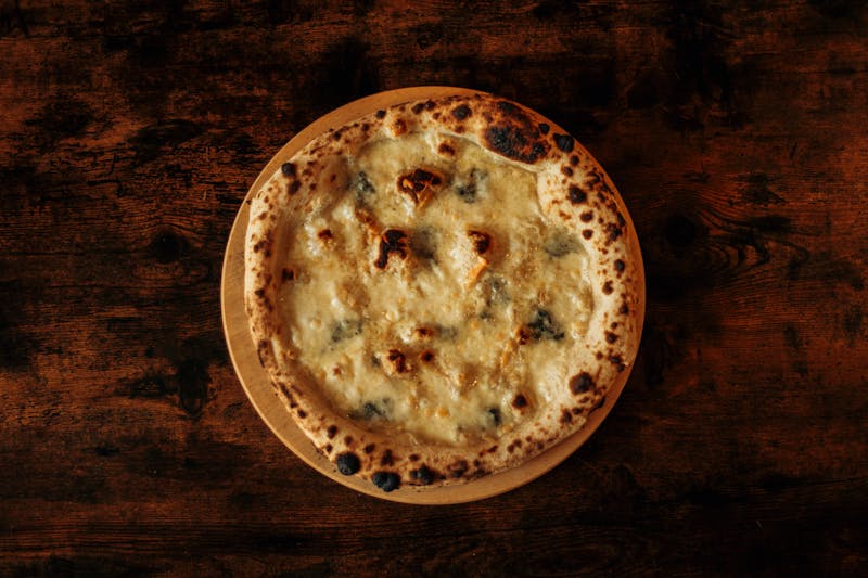 Quattro Formaggi four cheese punch pizza